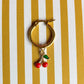 Golden hoop earrings with cherries